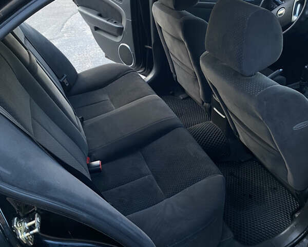 Черный Шевроле Эпика, объемом двигателя 1.99 л и пробегом 148 тыс. км за 4800 $, фото 10 на Automoto.ua