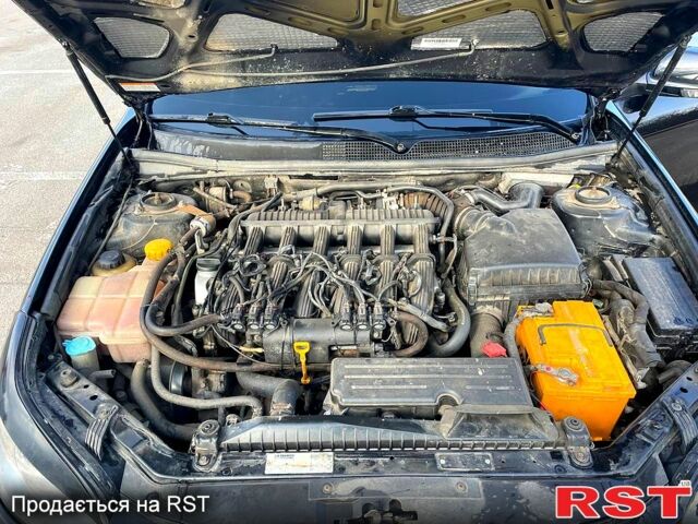 Черный Шевроле Эпика, объемом двигателя 2 л и пробегом 190 тыс. км за 4000 $, фото 6 на Automoto.ua