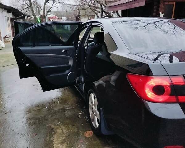 Черный Шевроле Эпика, объемом двигателя 2.5 л и пробегом 295 тыс. км за 3970 $, фото 1 на Automoto.ua