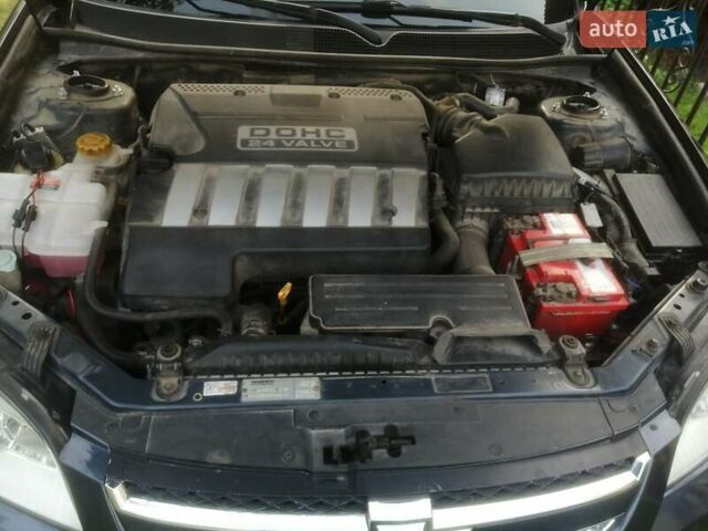 Черный Шевроле Эпика, объемом двигателя 1.99 л и пробегом 266 тыс. км за 4200 $, фото 24 на Automoto.ua