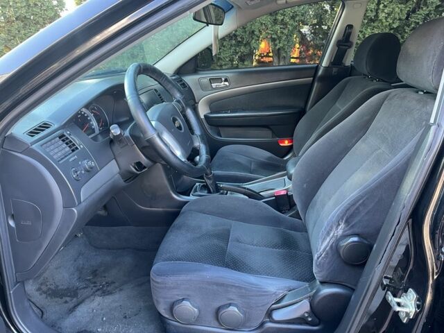 Шевроле Епіка 2007 у Белой Церкве на Automoto.ua Чорний Шевроле Епіка, об'ємом двигуна 2 л та пробігом 220 тис. км за 4900 $, фото 9 на Automoto.ua