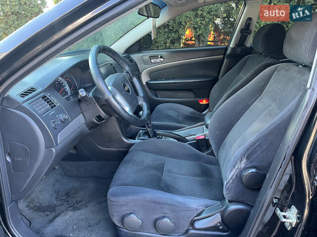 Шевроле Епіка 2007 у Белой Церкве на Automoto.ua Чорний Шевроле Епіка, об'ємом двигуна 1.99 л та пробігом 220 тис. км за 4900 $, фото 9 на Automoto.ua