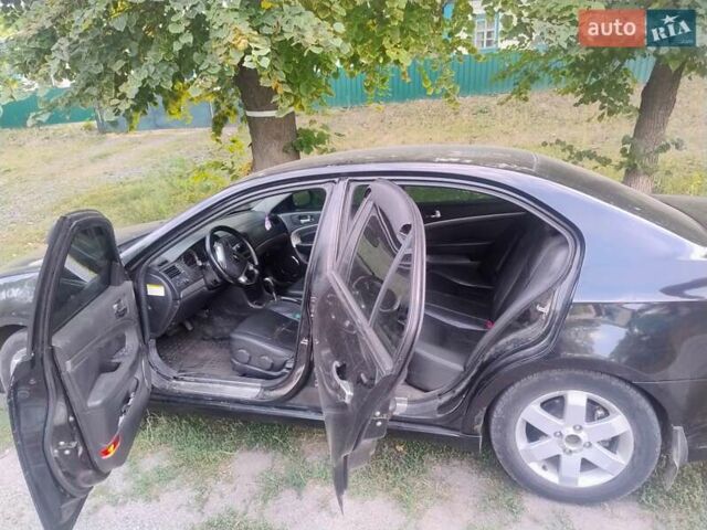 Черный Шевроле Эпика, объемом двигателя 2.5 л и пробегом 240 тыс. км за 3300 $, фото 2 на Automoto.ua