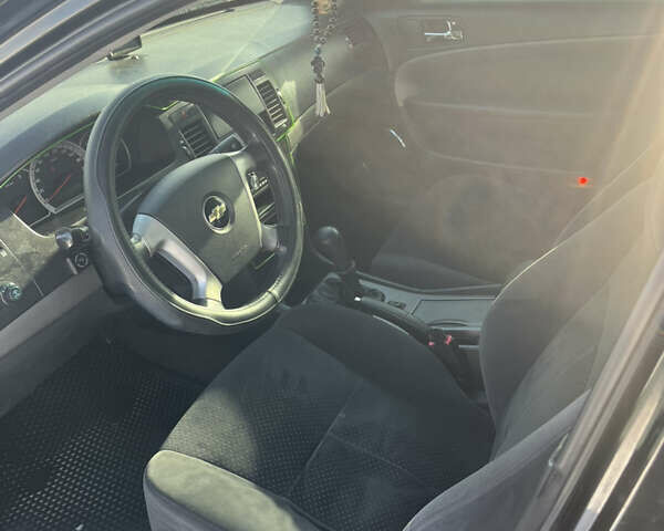 Чорний Шевроле Епіка, об'ємом двигуна 2 л та пробігом 297 тис. км за 4700 $, фото 4 на Automoto.ua