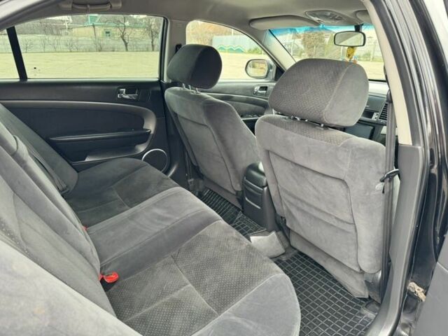 Чорний Шевроле Епіка, об'ємом двигуна 2 л та пробігом 283 тис. км за 5300 $, фото 9 на Automoto.ua