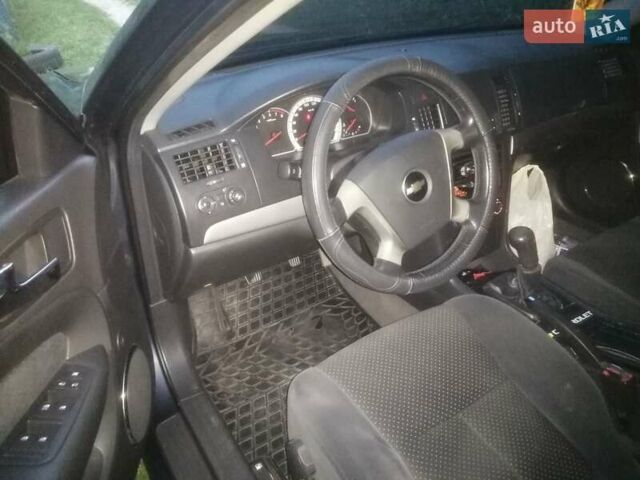 Черный Шевроле Эпика, объемом двигателя 1.99 л и пробегом 266 тыс. км за 4200 $, фото 28 на Automoto.ua