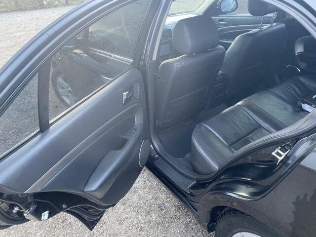 Черный Шевроле Эпика, объемом двигателя 2 л и пробегом 225 тыс. км за 2700 $, фото 7 на Automoto.ua