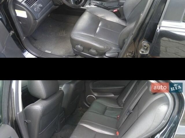 Черный Шевроле Эпика, объемом двигателя 2.5 л и пробегом 230 тыс. км за 4500 $, фото 2 на Automoto.ua