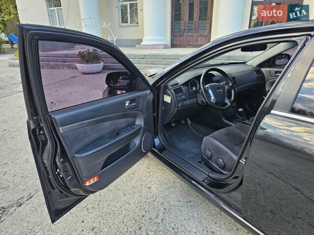 Черный Шевроле Эпика, объемом двигателя 1.99 л и пробегом 180 тыс. км за 5000 $, фото 6 на Automoto.ua