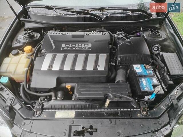 Черный Шевроле Эпика, объемом двигателя 2.49 л и пробегом 233 тыс. км за 5800 $, фото 19 на Automoto.ua