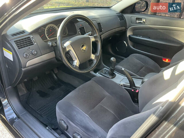 Черный Шевроле Эпика, объемом двигателя 2 л и пробегом 190 тыс. км за 4950 $, фото 37 на Automoto.ua