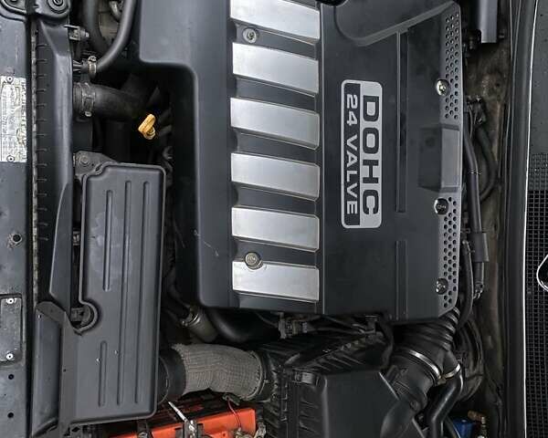 Чорний Шевроле Епіка, об'ємом двигуна 1.99 л та пробігом 250 тис. км за 4500 $, фото 5 на Automoto.ua