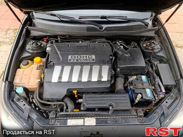 Черный Шевроле Эпика, объемом двигателя 2 л и пробегом 201 тыс. км за 3700 $, фото 8 на Automoto.ua