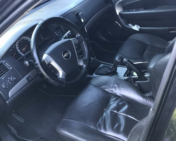 Черный Шевроле Эпика, объемом двигателя 1.99 л и пробегом 281 тыс. км за 5500 $, фото 3 на Automoto.ua