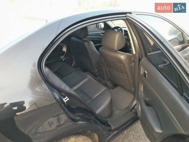 Черный Шевроле Эпика, объемом двигателя 2.5 л и пробегом 190 тыс. км за 5000 $, фото 12 на Automoto.ua