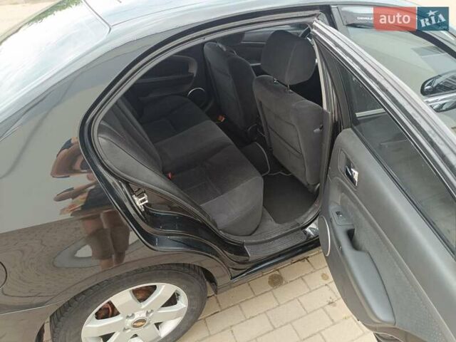 Черный Шевроле Эпика, объемом двигателя 1.99 л и пробегом 162 тыс. км за 5299 $, фото 12 на Automoto.ua