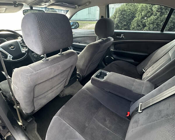 Черный Шевроле Эпика, объемом двигателя 2 л и пробегом 230 тыс. км за 4700 $, фото 17 на Automoto.ua