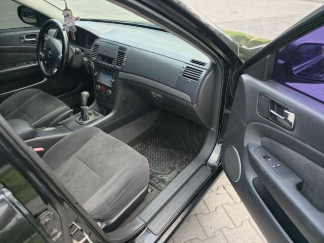 Чорний Шевроле Епіка, об'ємом двигуна 2 л та пробігом 278 тис. км за 3800 $, фото 7 на Automoto.ua