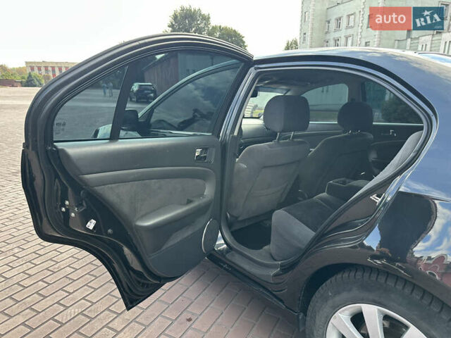 Черный Шевроле Эпика, объемом двигателя 2 л и пробегом 230 тыс. км за 4700 $, фото 19 на Automoto.ua