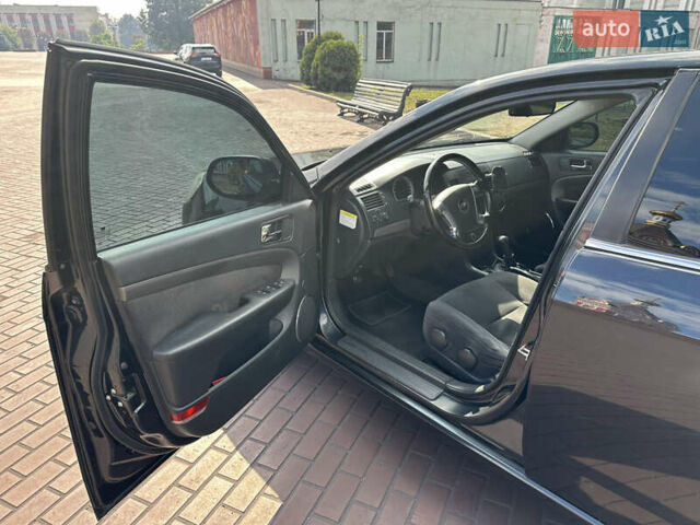 Черный Шевроле Эпика, объемом двигателя 2 л и пробегом 230 тыс. км за 4700 $, фото 16 на Automoto.ua