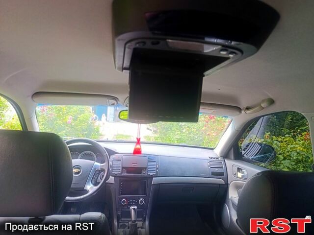 Черный Шевроле Эпика, объемом двигателя 2 л и пробегом 201 тыс. км за 3700 $, фото 6 на Automoto.ua