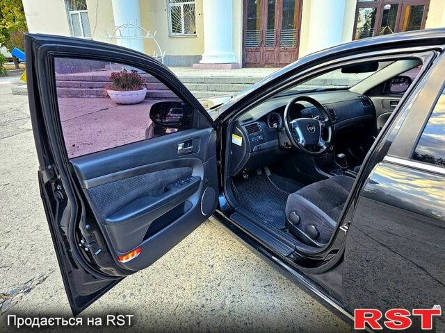 Черный Шевроле Эпика, объемом двигателя 2 л и пробегом 180 тыс. км за 5000 $, фото 5 на Automoto.ua