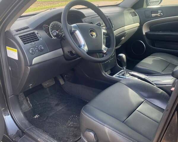 Черный Шевроле Эпика, объемом двигателя 2.49 л и пробегом 173 тыс. км за 6500 $, фото 4 на Automoto.ua