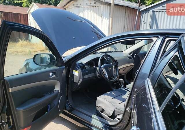 Черный Шевроле Эпика, объемом двигателя 2.5 л и пробегом 113 тыс. км за 8000 $, фото 3 на Automoto.ua