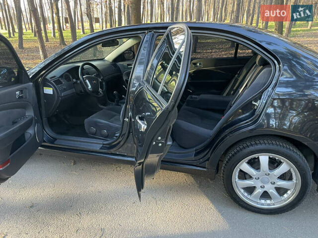 Черный Шевроле Эпика, объемом двигателя 2 л и пробегом 190 тыс. км за 4950 $, фото 64 на Automoto.ua