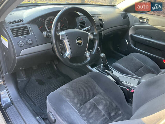 Черный Шевроле Эпика, объемом двигателя 2 л и пробегом 190 тыс. км за 4950 $, фото 83 на Automoto.ua