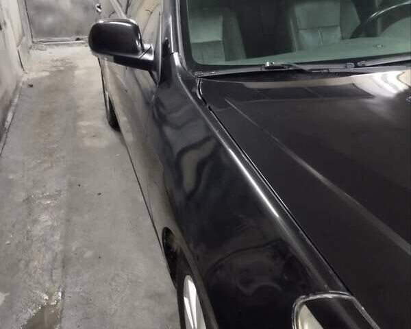 Чорний Шевроле Епіка, об'ємом двигуна 2.5 л та пробігом 259 тис. км за 5200 $, фото 3 на Automoto.ua