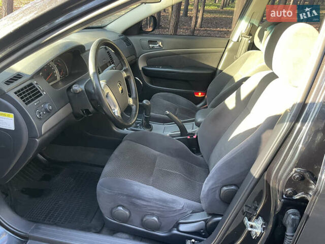 Черный Шевроле Эпика, объемом двигателя 2 л и пробегом 190 тыс. км за 4950 $, фото 36 на Automoto.ua