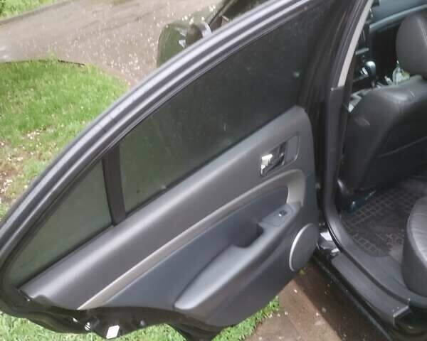 Черный Шевроле Эпика, объемом двигателя 2.49 л и пробегом 233 тыс. км за 5800 $, фото 12 на Automoto.ua