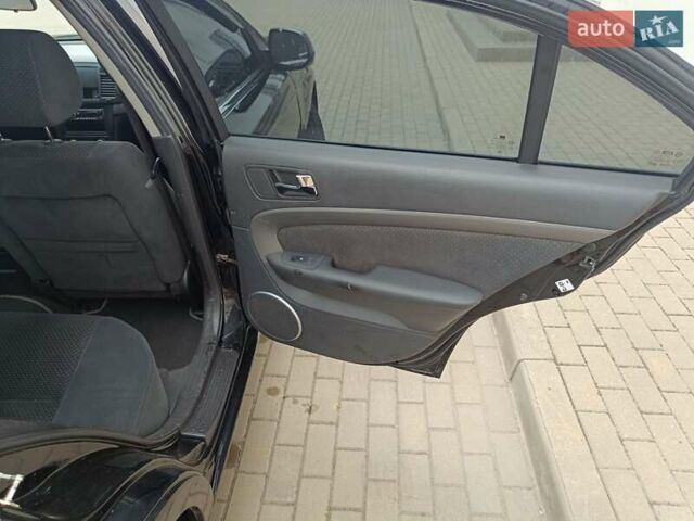 Черный Шевроле Эпика, объемом двигателя 1.99 л и пробегом 162 тыс. км за 5299 $, фото 13 на Automoto.ua