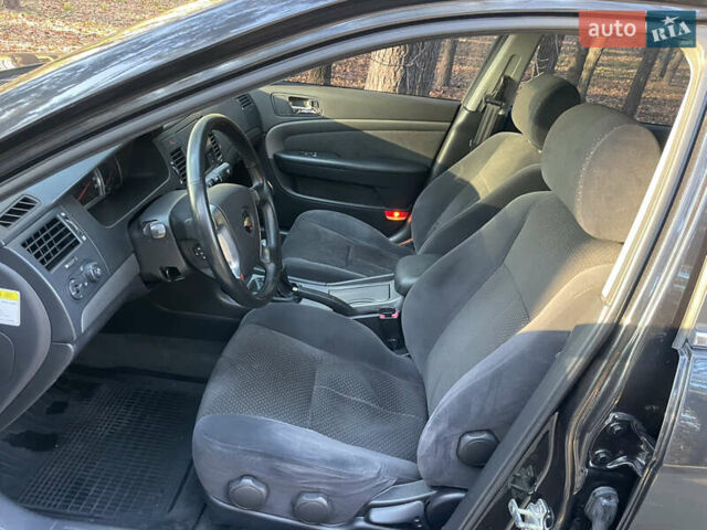 Черный Шевроле Эпика, объемом двигателя 2 л и пробегом 190 тыс. км за 4950 $, фото 80 на Automoto.ua