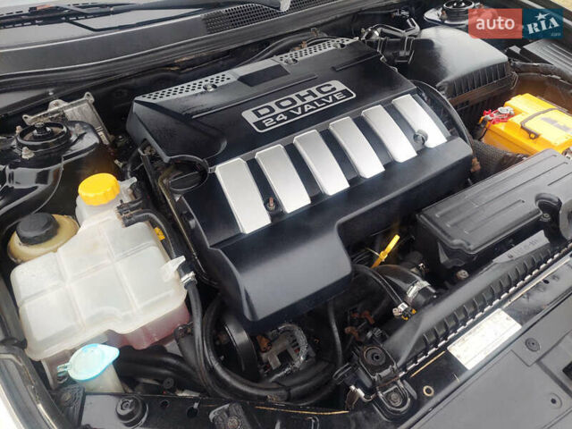 Чорний Шевроле Епіка, об'ємом двигуна 1.99 л та пробігом 205 тис. км за 3150 $, фото 12 на Automoto.ua