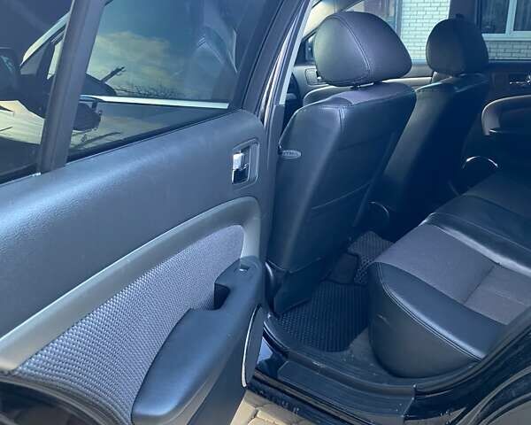 Черный Шевроле Эпика, объемом двигателя 1.99 л и пробегом 234 тыс. км за 5500 $, фото 16 на Automoto.ua