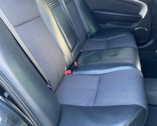 Черный Шевроле Эпика, объемом двигателя 1.99 л и пробегом 234 тыс. км за 5500 $, фото 12 на Automoto.ua