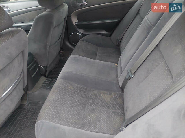 Черный Шевроле Эпика, объемом двигателя 1.99 л и пробегом 205 тыс. км за 3750 $, фото 8 на Automoto.ua