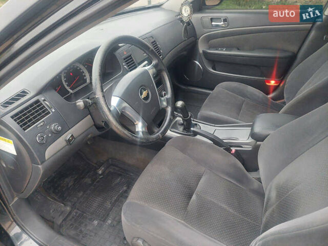 Черный Шевроле Эпика, объемом двигателя 1.99 л и пробегом 205 тыс. км за 3750 $, фото 6 на Automoto.ua