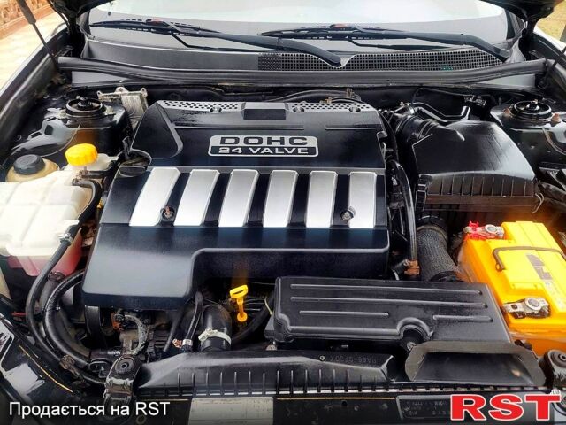 Черный Шевроле Эпика, объемом двигателя 2 л и пробегом 205 тыс. км за 3350 $, фото 10 на Automoto.ua