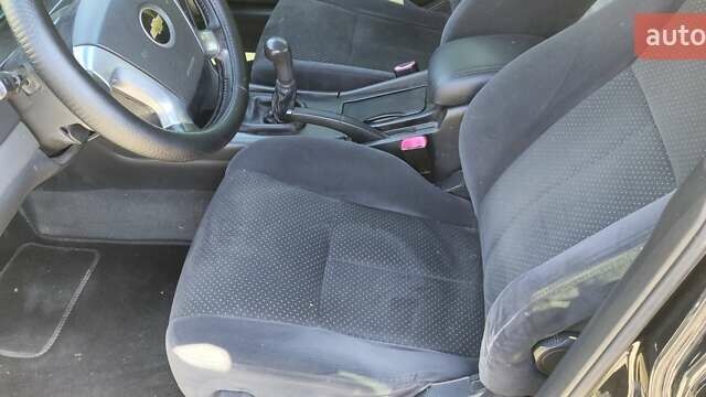 Чорний Шевроле Епіка, об'ємом двигуна 2 л та пробігом 131 тис. км за 5400 $, фото 18 на Automoto.ua