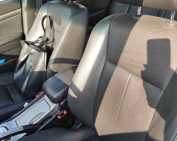 Черный Шевроле Эпика, объемом двигателя 2.49 л и пробегом 189 тыс. км за 5600 $, фото 3 на Automoto.ua