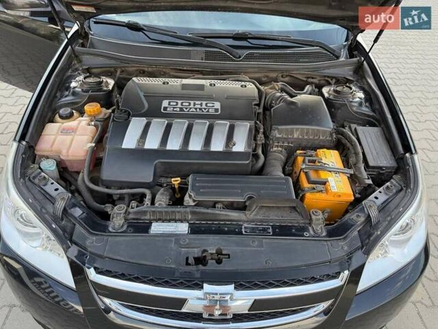 Черный Шевроле Эпика, объемом двигателя 1.99 л и пробегом 163 тыс. км за 5800 $, фото 8 на Automoto.ua