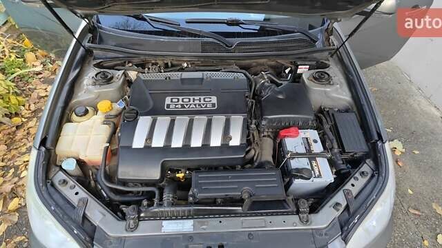 Коричневий Шевроле Епіка, об'ємом двигуна 1.99 л та пробігом 176 тис. км за 6000 $, фото 10 на Automoto.ua