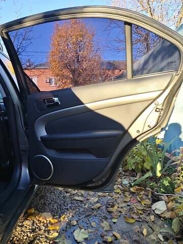 Коричневий Шевроле Епіка, об'ємом двигуна 1.99 л та пробігом 176 тис. км за 6000 $, фото 20 на Automoto.ua