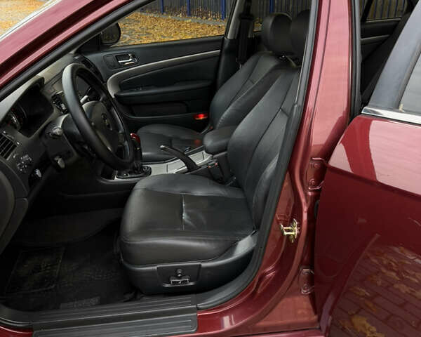 Красный Шевроле Эпика, объемом двигателя 2 л и пробегом 236 тыс. км за 4300 $, фото 19 на Automoto.ua