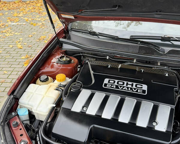 Красный Шевроле Эпика, объемом двигателя 2 л и пробегом 236 тыс. км за 4350 $, фото 39 на Automoto.ua