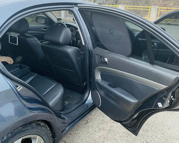 Серый Шевроле Эпика, объемом двигателя 2.49 л и пробегом 270 тыс. км за 6000 $, фото 2 на Automoto.ua