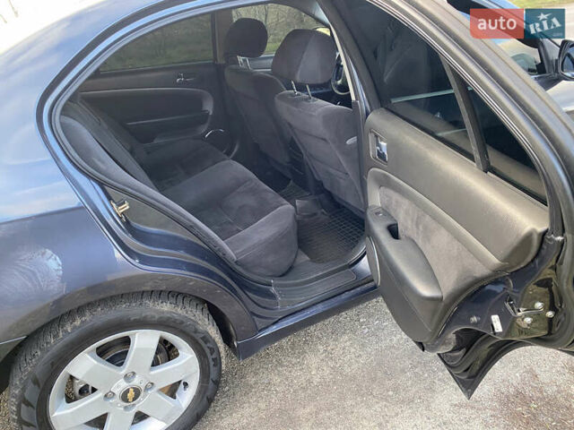 Сірий Шевроле Епіка, об'ємом двигуна 1.99 л та пробігом 207 тис. км за 4800 $, фото 7 на Automoto.ua